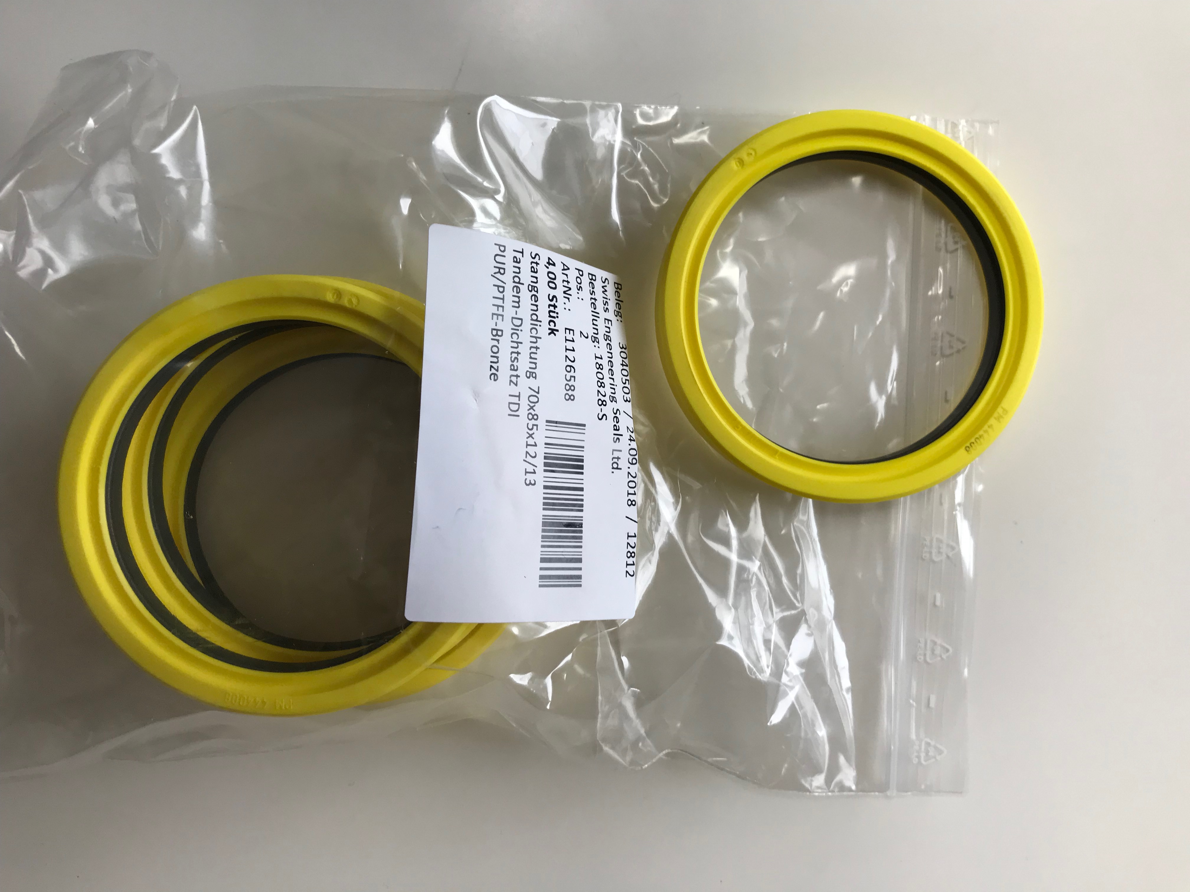 Yellow tandem packing PUR PTFE Bronce